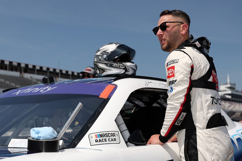 Justin Bonsignore looks on.