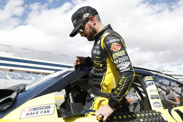 Jermey Clements climbs into car.