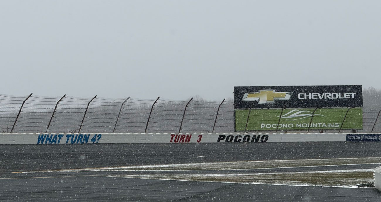 A view of Turn 3 at Pocono Raceway as snow falls.