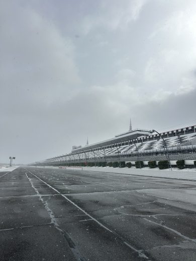 A view of the frontstretch at Pocono Raceway as snow falls.