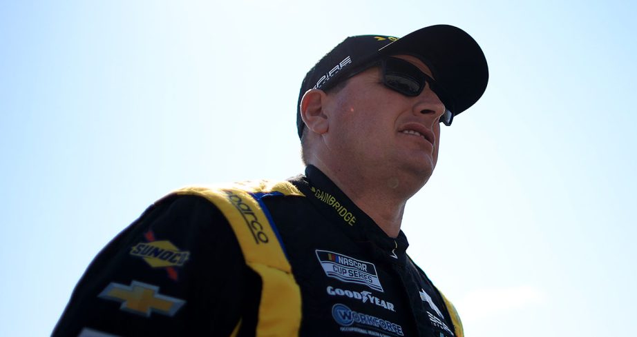 Michael McDowell looks on.