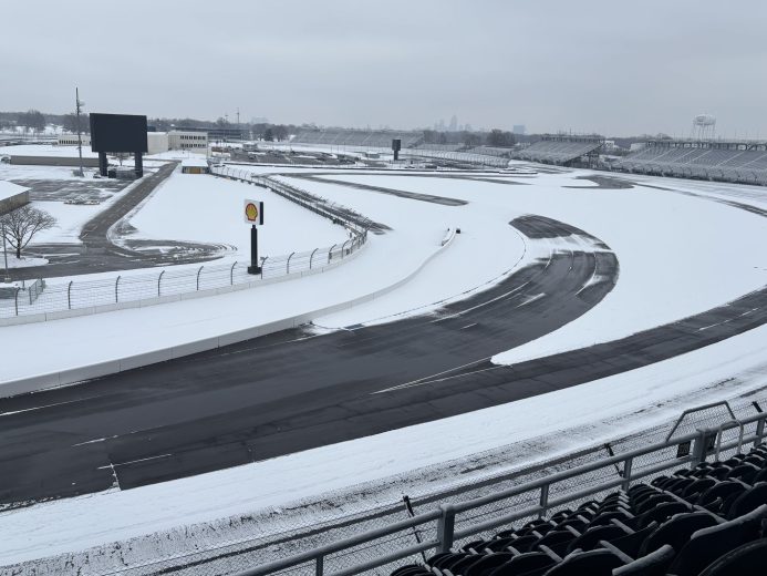 A blanket of snow covers the Indianapolis Motor Speedway, with wintry weather in the turns and access roads