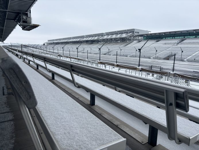 A blanket of snow covers the Indianapolis Motor Speedway, with a dusting of wintry weather on the bleachers