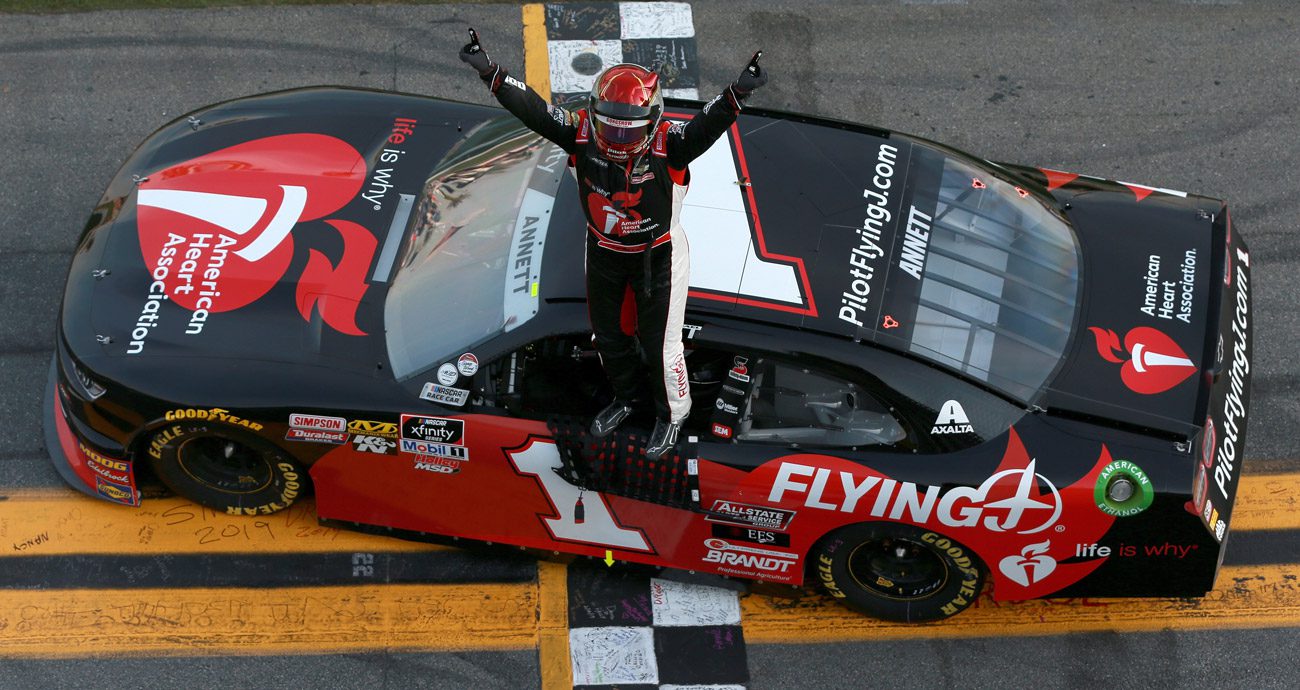 Michael Annett celebrates his 2019 Xfinity Series win at Daytona.