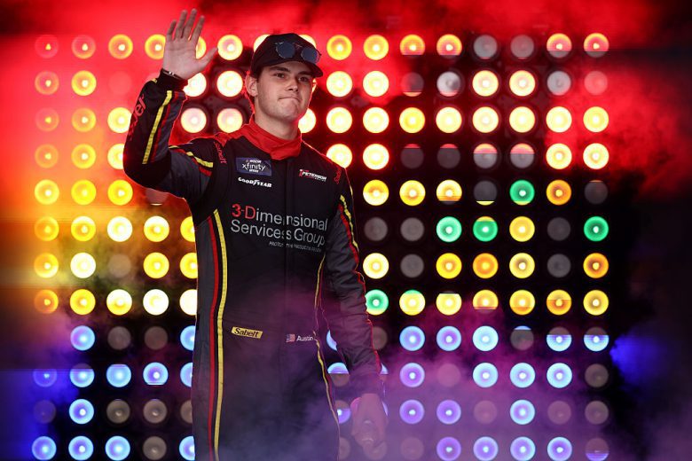 Austin Green waves to the audience.
