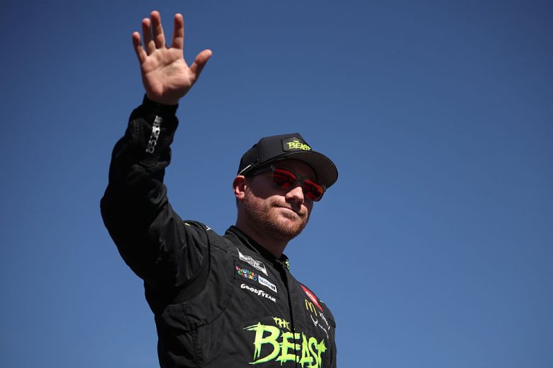 Tyler Reddick looks on.