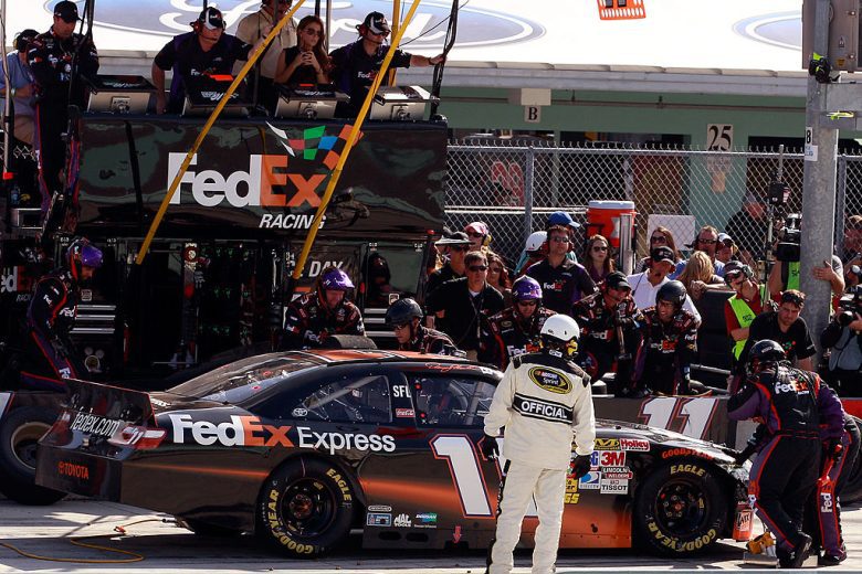 Denny Hamlin makes a pit stop in the No. 11 Toyota.