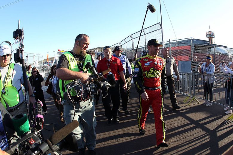 Clint Bowyer walks to the garage.