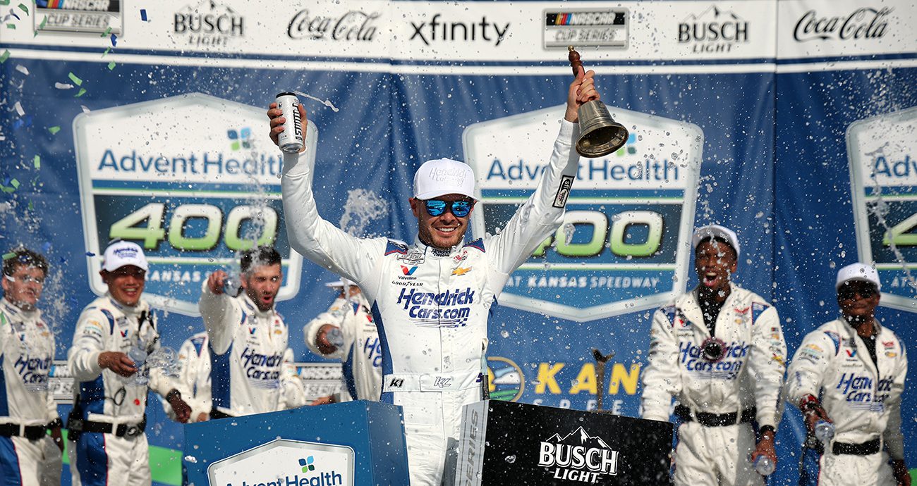 KANSAS CITY, KANSAS - MAY 11: Kyle Larson, driver of the #5 HendrickCars.com Chevrolet, celebrates in victory lane after winning the NASCAR Cup Series AdventHealth 400 at Kansas Speedway on May 11, 2025 in Kansas City, Kansas. (