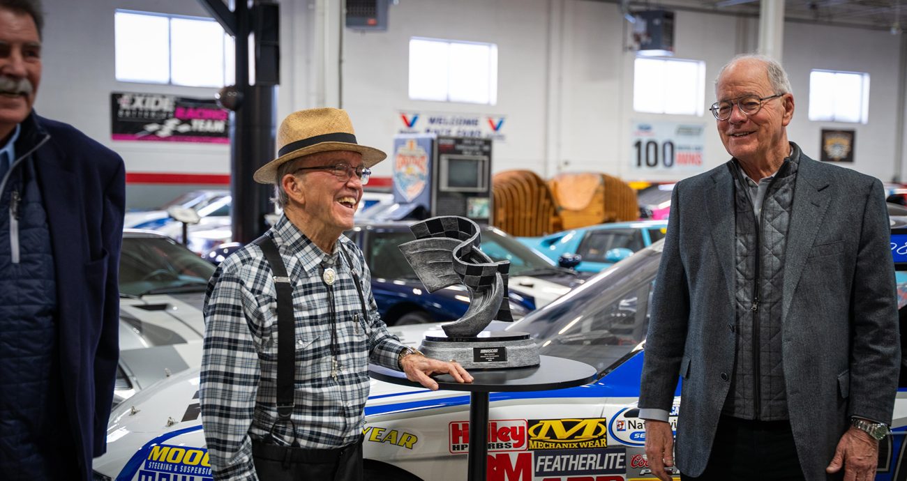 Jack Roush and Jim France pose with the Bill France Award of Excellence.