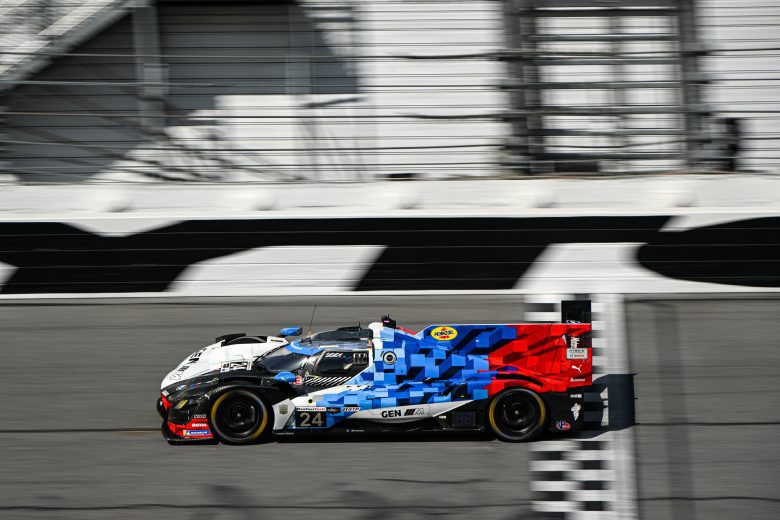 The No. 24 BMW M Team WRT BMW drives at Daytona.