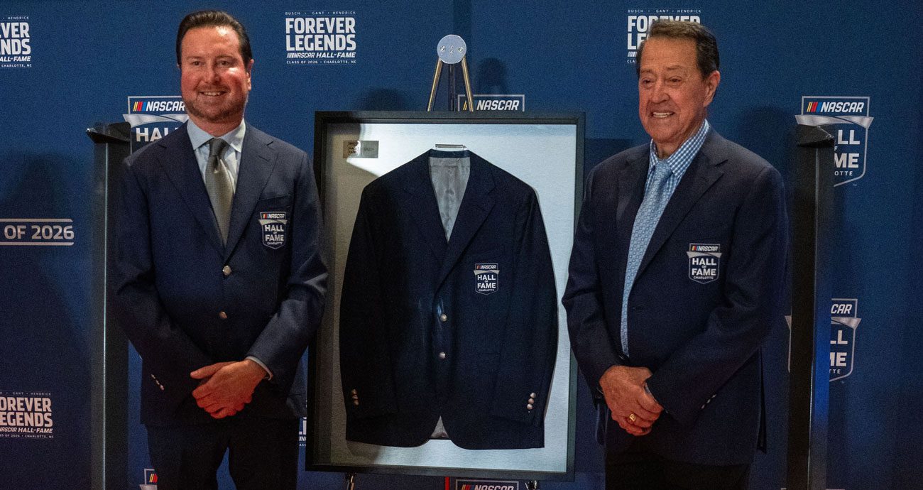 Kurt Busch and Harry Gant pose with their NASCAR Hall of Fame jackets.