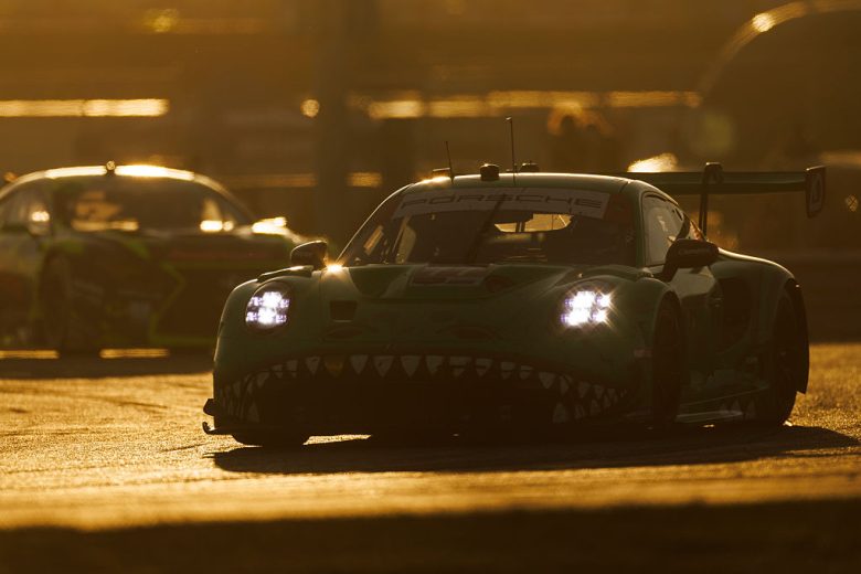 The No. 77 AO Racing Porsche drives at Daytona.