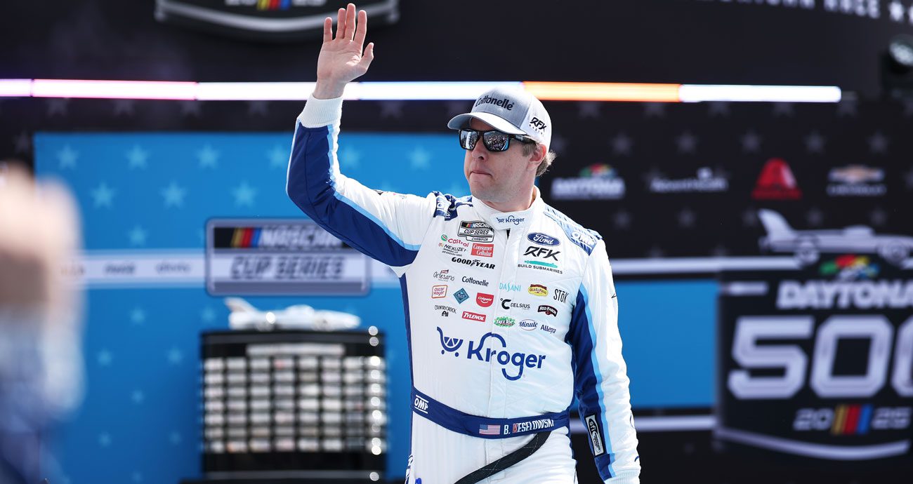Brad Keselowski waves ahead of the 2025 Daytona 500.