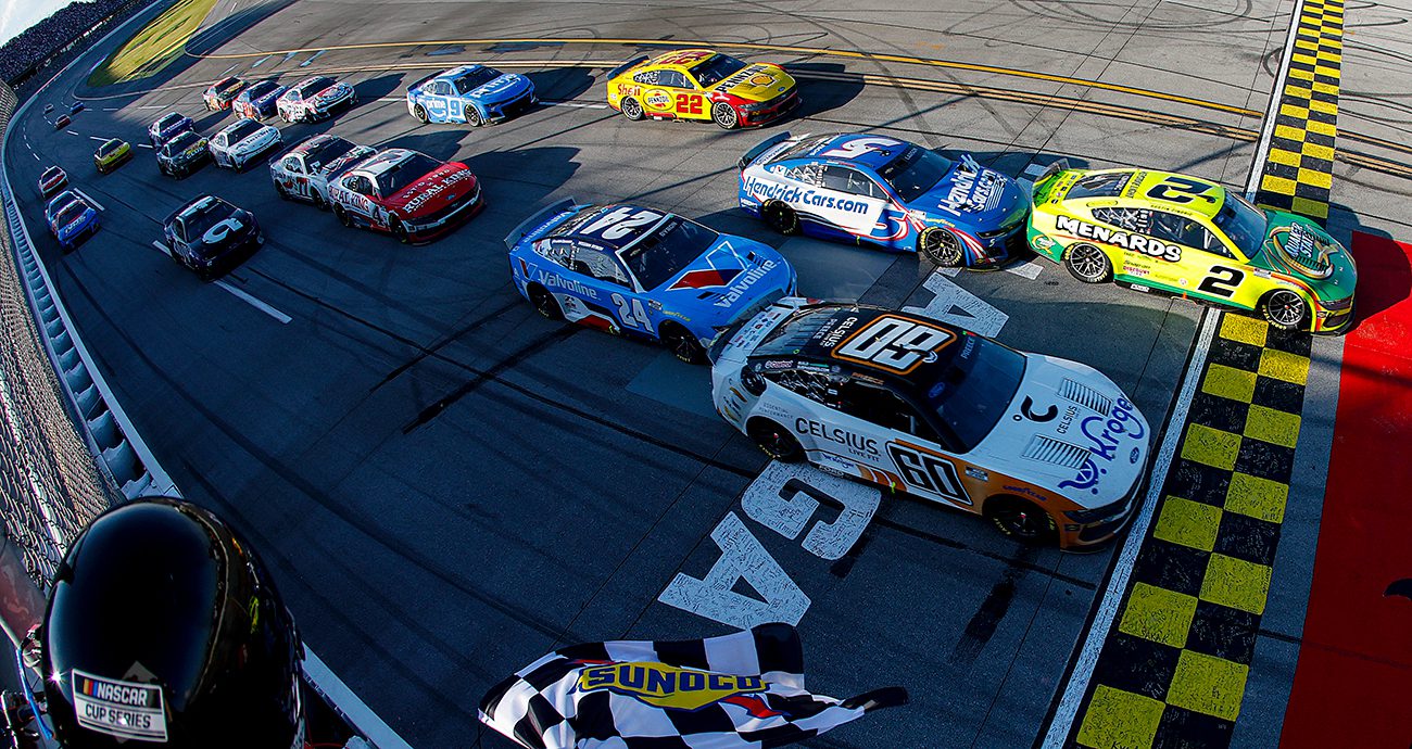 austin cindric crosses the finish line first at talladega