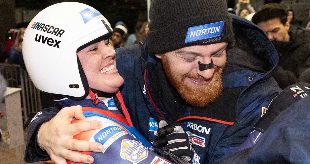 Summer Britcher celebrates with Jonathan Eric Gustafson of Team USA in the Eberspächer Luge World Cup event in Park City, Utah