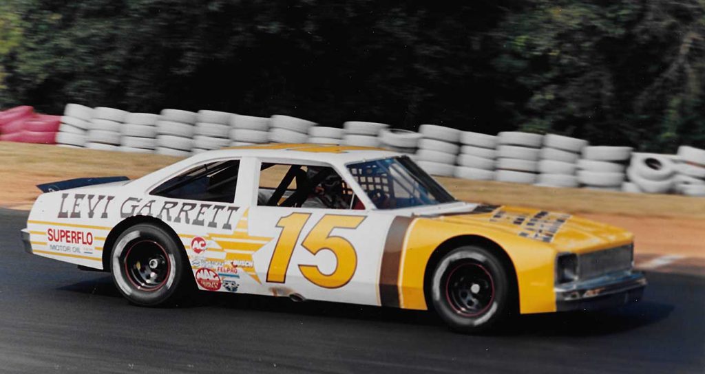 Team owner Rick Hendrick wheels the No. 15 Chevrolet on the Road Atlanta track in the 1980s