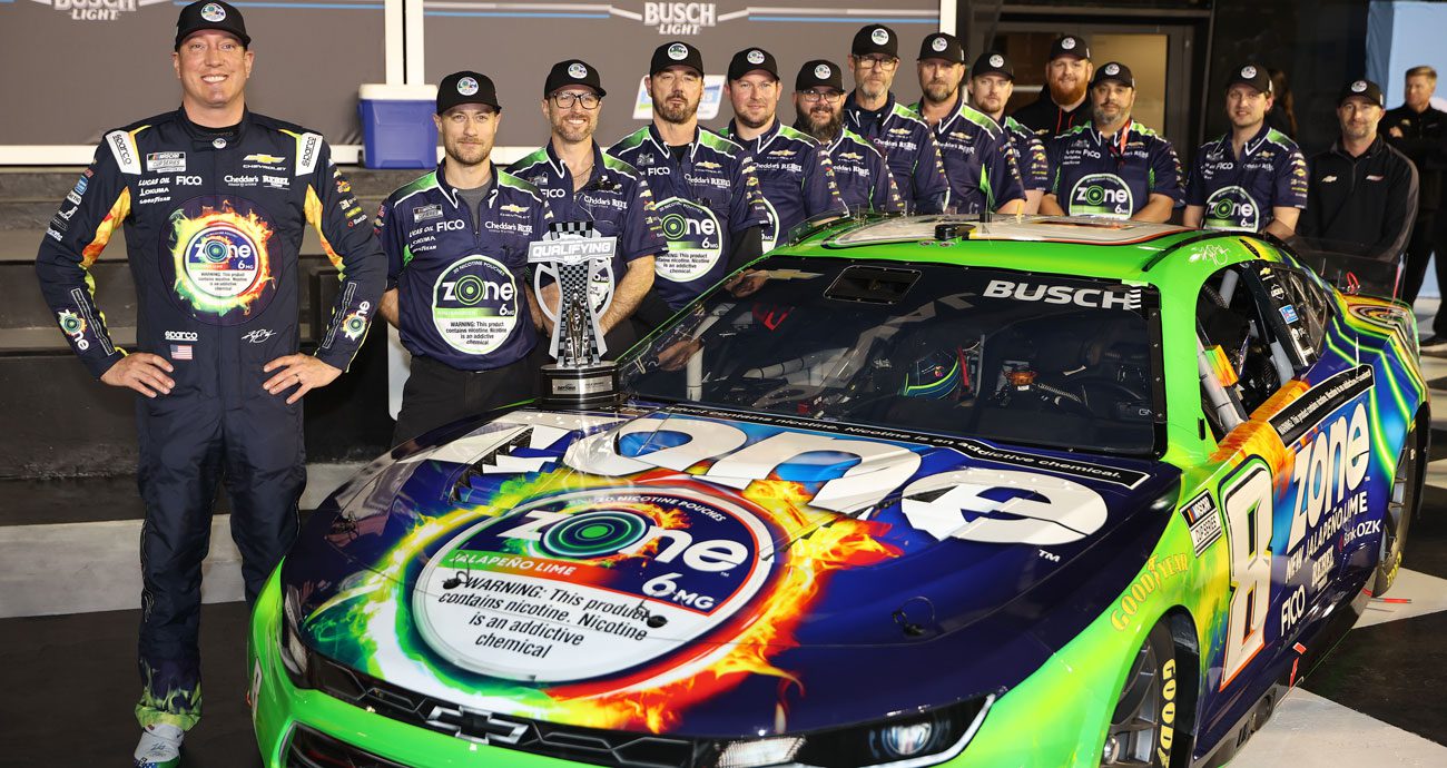 Kyle Busch and his No. 8 Richard Childress Racing crew pose for a photo in Victory Lane.