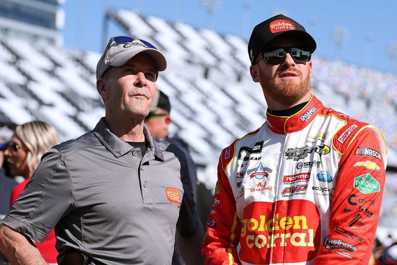 Ward Burton and Jeb Burton look on.