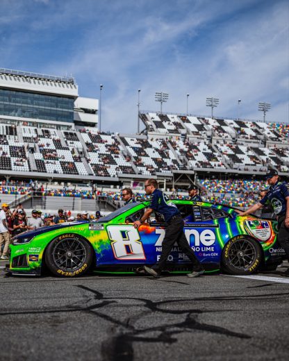 The No. 8 Chevrolet gets pushed to the grid at Daytona.