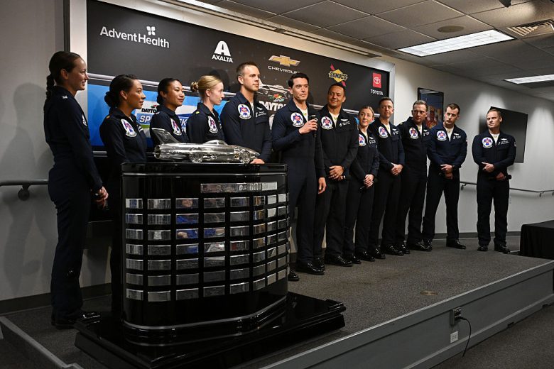 The Thunderbirds pose for a photo.