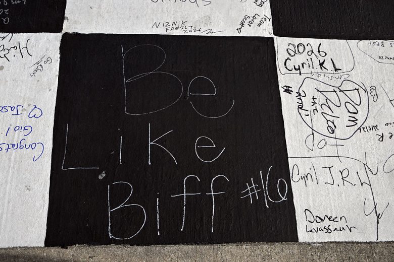 A view of the finish line with Be Like Biff signage.