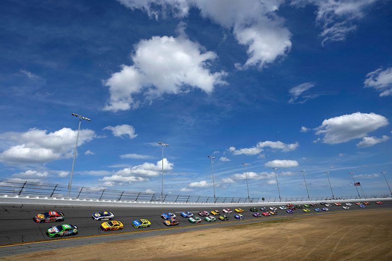 NASCAR Cup Series cars race at Daytona.
