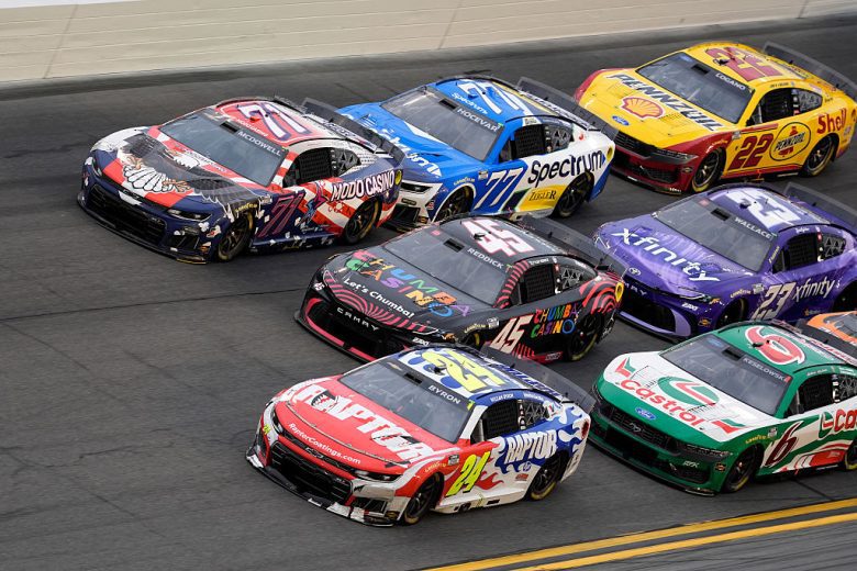 NASCAR Cup Series cars race at Daytona International Speedway.