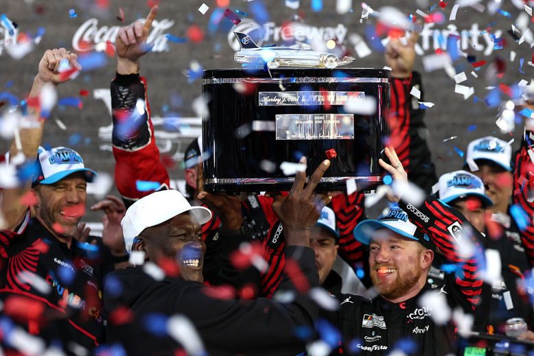 Michael Jordan (L) and Tyler Reddick (R) pose for a photo in Victory Lane.