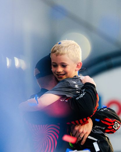 Tyler Reddick hugs his son, Beau.