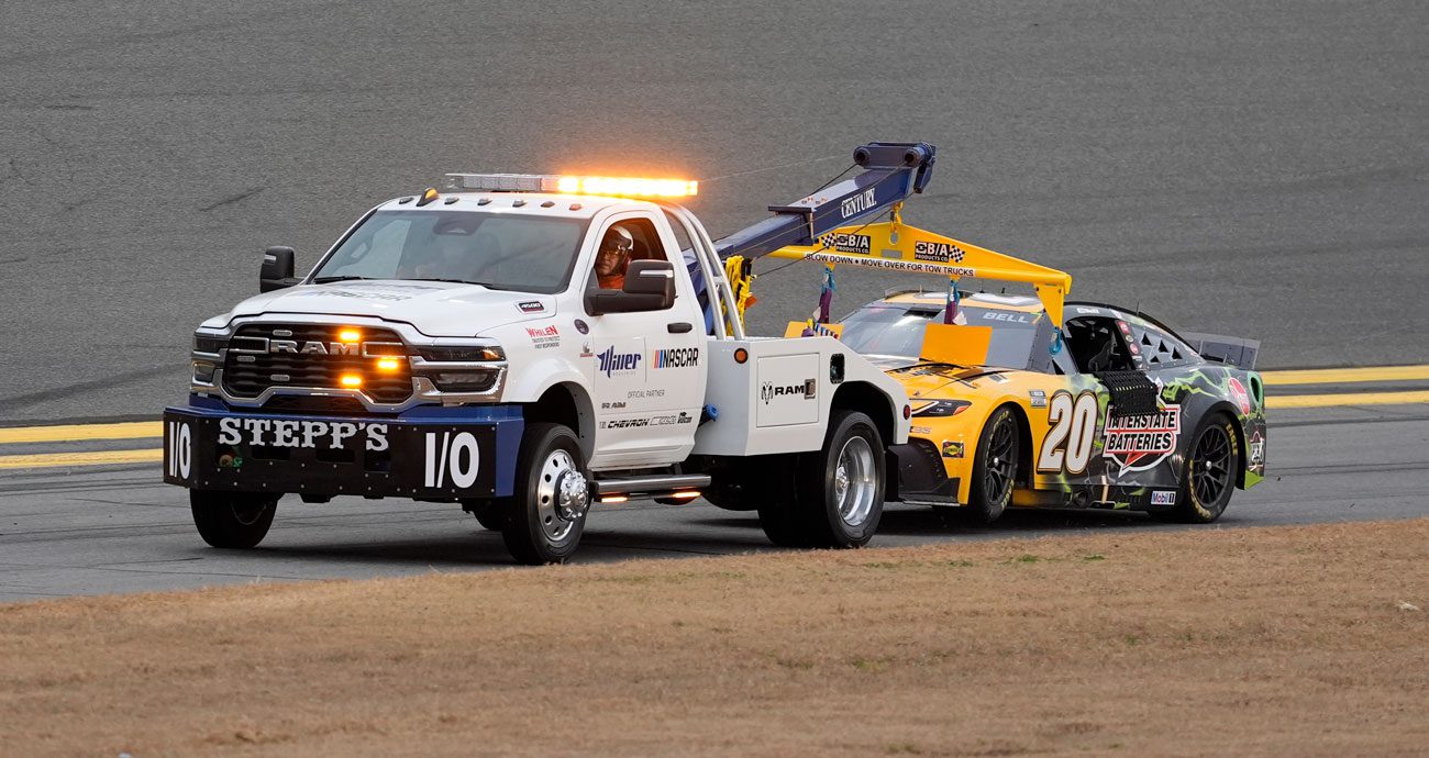 The No. 20 Joe Gibbs Racing Toyota of Christopher Bell gets towed.