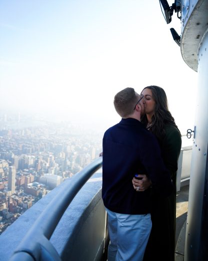 Tyler Reddick and wife Alexa share a kiss atop the Empire State Building.