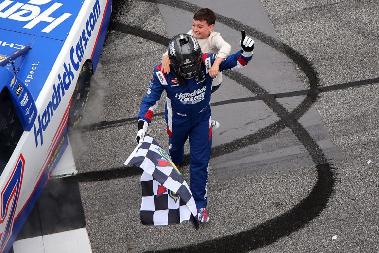 Kyle Busch celebrates with Brexton Busch.