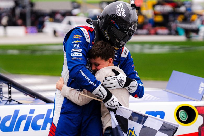 Kyle Busch hugs Brexton Busch.