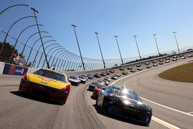 NASCAR Cup Series cars race at EchoPark Speedway.