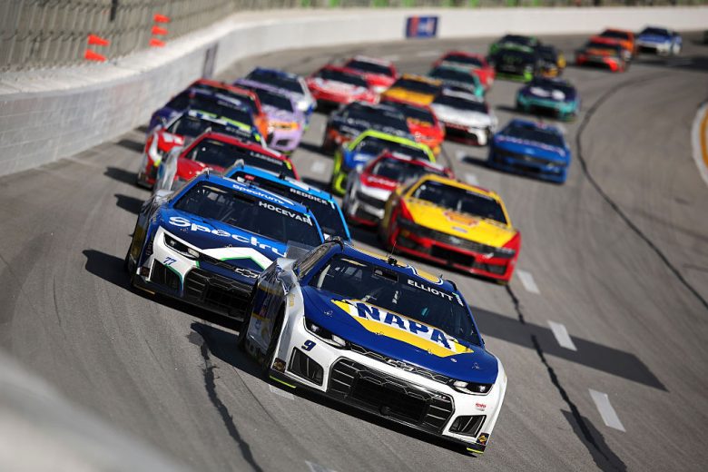 NASCAR Cup Series cars race at EchoPark Speedway.