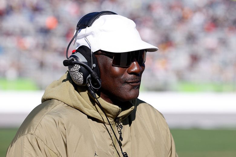Michael Jordan looks on.