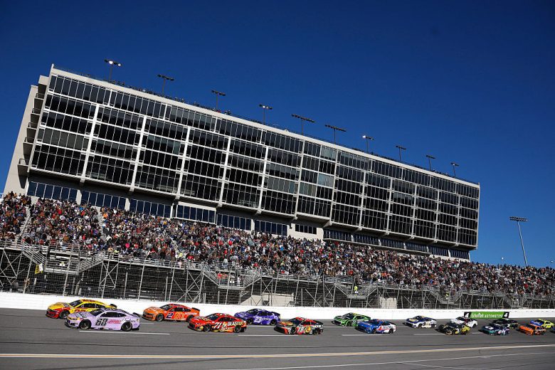 NASCAR Cup Series cars race at EchoPark Speedway.