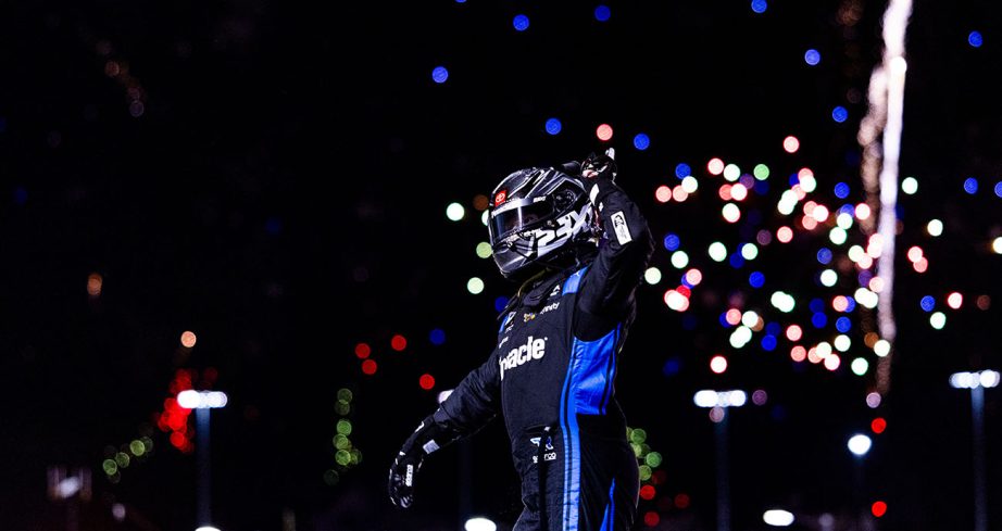 View of Tyler Reddick celebrating win at EchoPark Speedway.