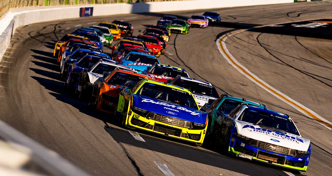 Zane Smith's No. 38 Ford leads the way alongside the No. 12 of Ryan Blaney at EchoPark Speedway