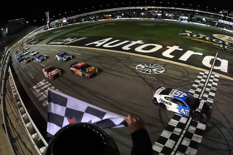Tyler Reddick crosses the start/finish line at EchoPark Speedway.