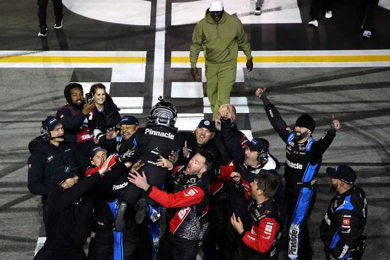 Tyler Reddick celebrates with his pit crew.