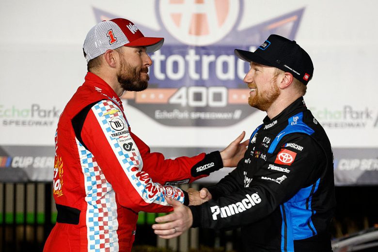 Ross Chastain (L) and Tyler Reddick (R) shake hands.