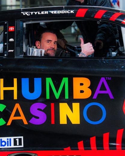 WWE World Heavyweight champion CM Punk in Tyler Reddick's No. 45 Chumba Casino Toyota at WWE's Monday Night Raw on Feb. 23, 2026 at State Farm Arena in Atlanta.