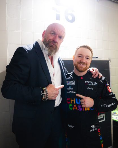 WWE Chief Content Officer Triple H with Daytona 500 champion Tyler Reddick on Feb. 23, 2026 at WWE's Monday Night Raw at State Farm Arena in Atlanta.