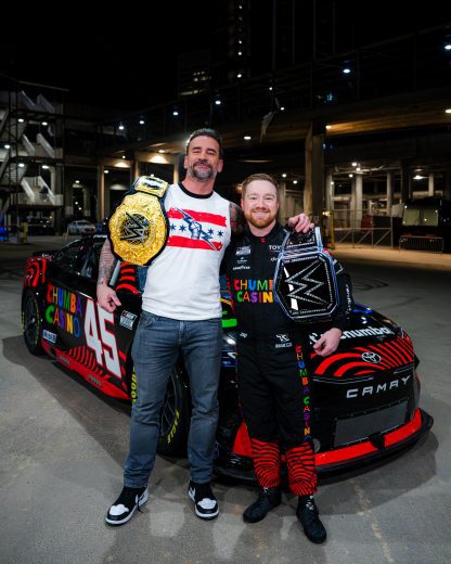 Tyler Reddick at WWE's Monday Night Raw with WWE World Heavyweight champion CM Punk on Feb. 23, 2026 at State Farm Arena in Atlanta.