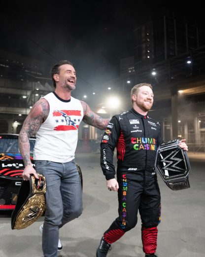 Tyler Reddick at WWE's Monday Night Raw with WWE World Heavyweight champion CM Punk on Feb. 23, 2026 at State Farm Arena in Atlanta.