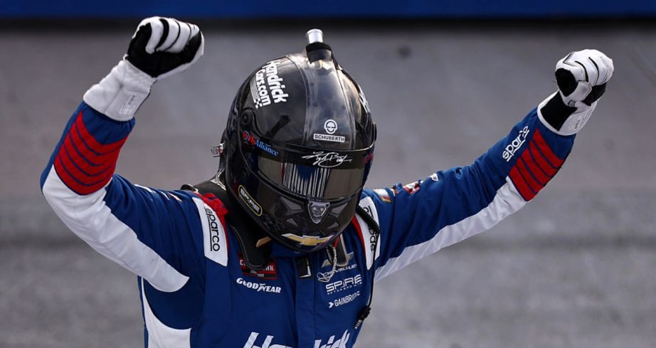 Kyle Busch celebrates after winning at Dover.