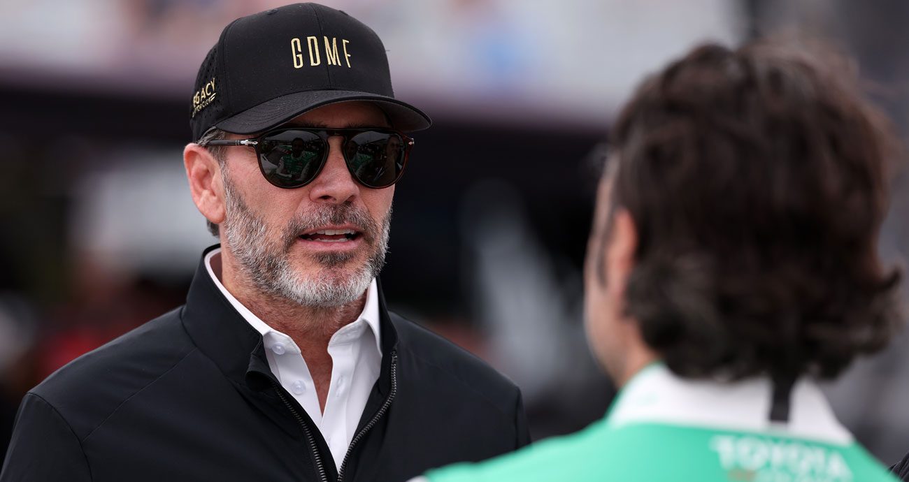 Jimmie Johnson speaks with Dario Franchitti at St. Petersburg.