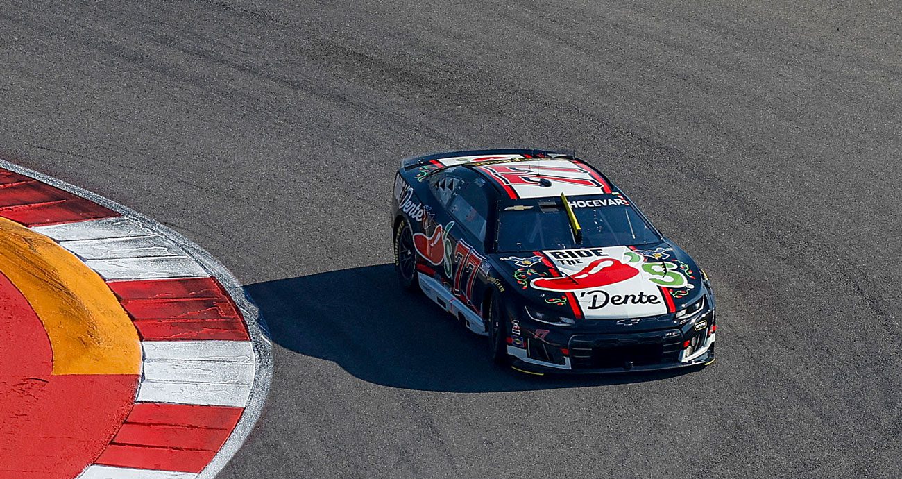 Carson Hocevar races in the No. 77 Chevrolet.